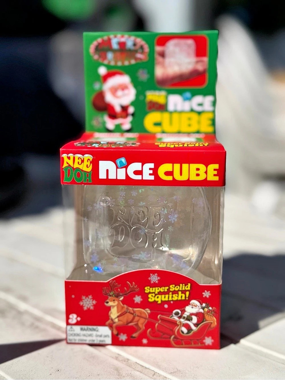 NeeDoh Nice Cube Squishy Cube Clear Christmas with Snowflakes
